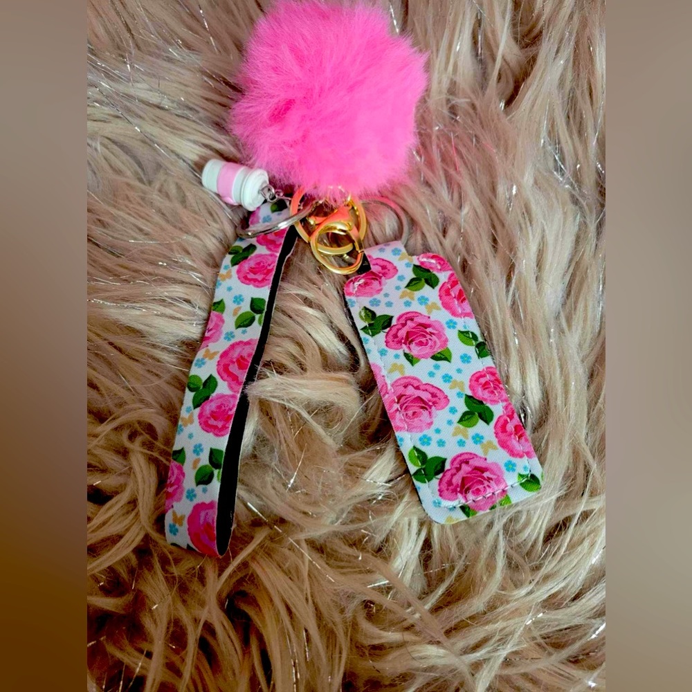 Rose pattern chapstick holder wristlet with fuzzy ball and coffee cup charm